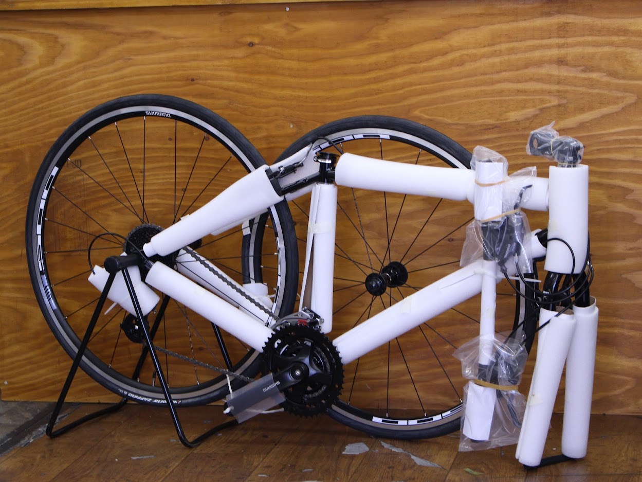 自転車の発送・組み立て工程の説明画像